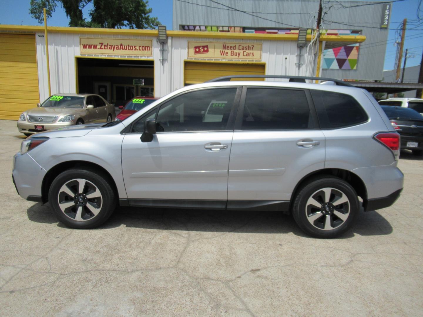 2018 Silver /Black Subaru Forester 2.5I (JF2SJABC5JH) with an 2.5L H4 F DOHC 16V engine, Automatic transmission, located at 1511 North Shepherd Dr., Houston, TX, 77008, (281) 657-1221, 29.798361, -95.412560 - 2018 SUBARU FORESTER 2.5I VIN: JF2SJABC5JH521576 J F 2 S J A B C 5 J H 5 2 1 5 7 6 4 DOOR WAGON/SPORT UTILITY 2.5L H4 F DOHC 16V GASOLINE ALL WHEEL DRIVE - Photo#0